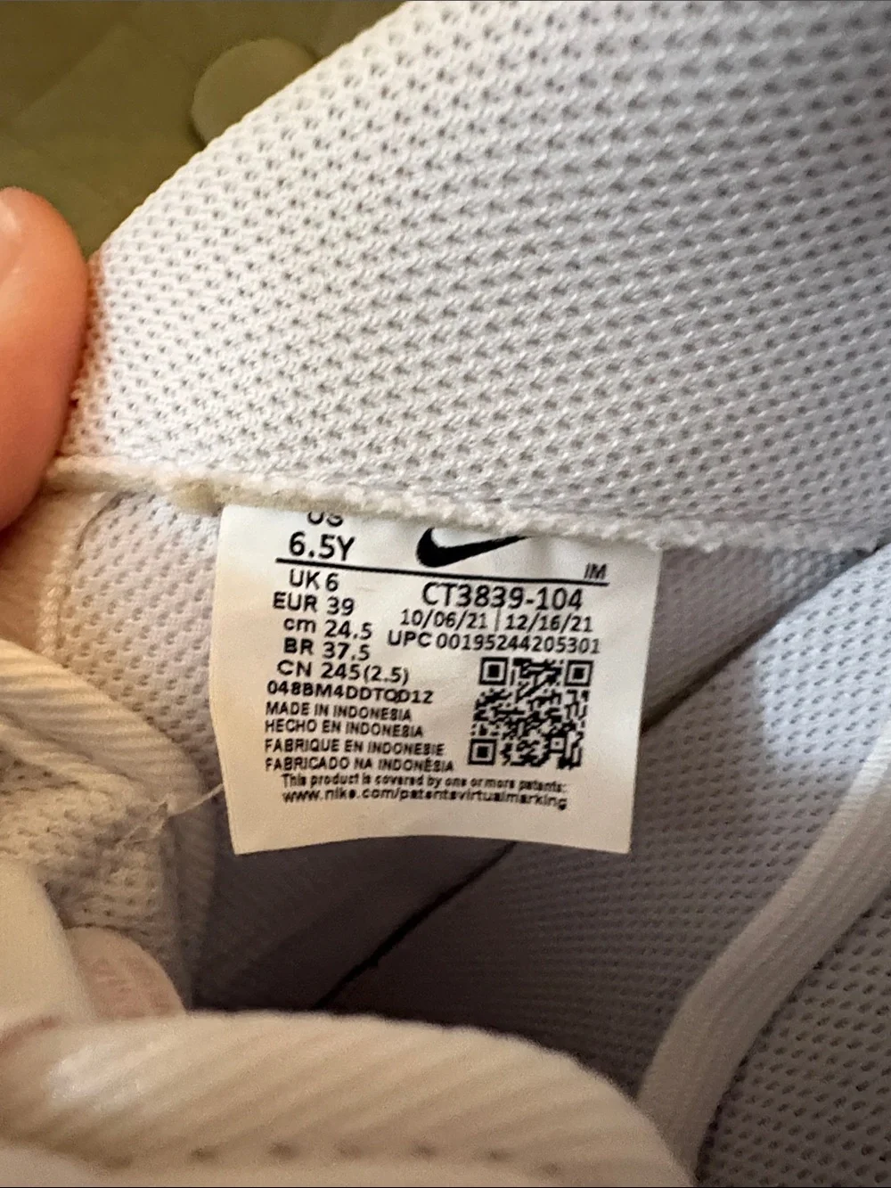 Nike Air Force White Sneakers with Pink Swoosh